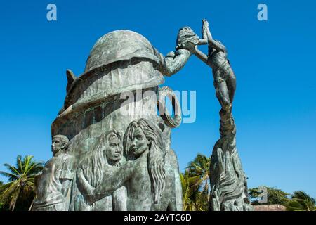 Detail of the monument to humanity, a bronze statue titled Portal Maya (Mayan Gateway), at the plaza in Playa del Carmen on the Riviera Maya near Canc Stock Photo