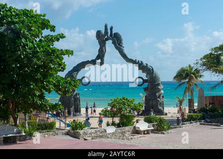 The monument to humanity, a bronze statue titled Portal Maya (Mayan Gateway), at the plaza in Playa del Carmen on the Riviera Maya near Cancun in the Stock Photo