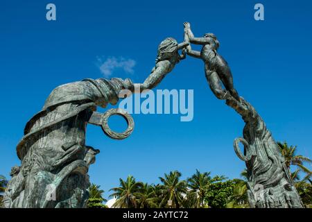 Detail of the monument to humanity, a bronze statue titled Portal Maya (Mayan Gateway), at the plaza in Playa del Carmen on the Riviera Maya near Canc Stock Photo