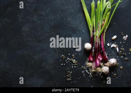 Premium Photo  Onion shallot on a black, dark background eating vegetables  and eating healthy eating shallots adding to various dishes, diversifying  food