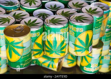 Amsterdam, Netherlands - March 31, 2016: Cans with cannabis seeds for sale on a market in Amsterdam Stock Photo