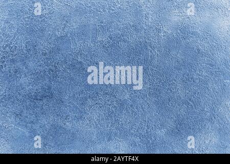 Blue spotted scratched stucco background closeup, rough cement texture backdrop, concrete grunge textured wall, decorative art silver plaster board Stock Photo