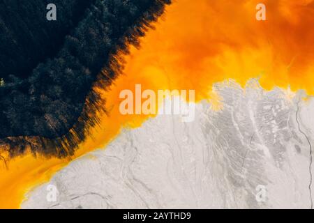 Drone view of contaminated, toxic water stream in Geamana, Romania Stock Photo