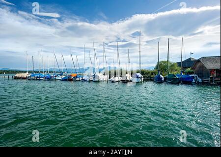Sailboats in the marina Seebruck, Seeon, Chiemsee, Chiemgau, Upper Bavaria, Bavaria, Germany Stock Photo