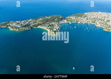 Aerial view of Vacluse suburb of Sydney with residential houses, beaches and Watsons bay with yachts and boats. Drone view of Sydney real estate resid Stock Photo