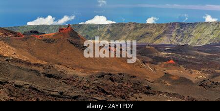 Cones of Cratere Rivals at southern slope of volcano Piton de la Fournaise at island La Reunion Stock Photo