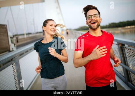 Young couple sporty people practicing yoga lesson with partner, man and  woman in yogi exercise, arm balance pose. 29257123 Vector Art at Vecteezy