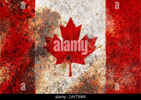 Canada flag on rusty metal background texture Stock Photo