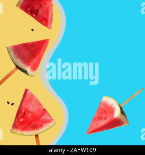 Slice of watermelon with splash of pink juice. Stock Photo