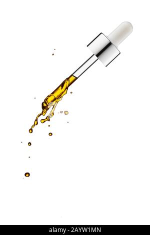 Cosmetic pipette of cosmetic oil close-up on a white background . Stock Photo