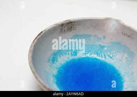 Making copper sulphate crystals in a UK school science experiment Stock Photo