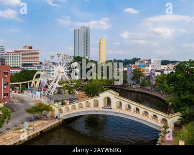 Aerial view of historic pedestrian Jambatan Bus Station Bridge over Melaka River, Malacca, Malaysia. Stock Photo