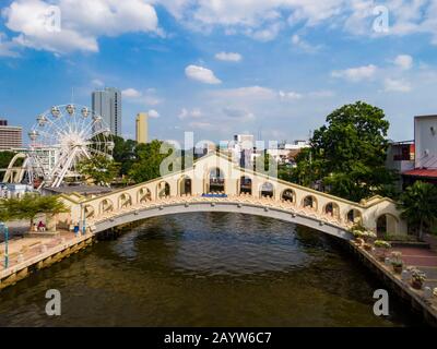 Aerial view of historic pedestrian Jambatan Bus Station Bridge over Melaka River, Malacca, Malaysia. Stock Photo