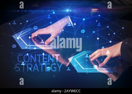 Navigating social networking with CONTENT STRATEGY inscription, new media concept Stock Photo