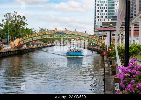 Historic pedestrian Kampung Morten Bridge Over Melaka River in Malacca Malaysia. Stock Photo