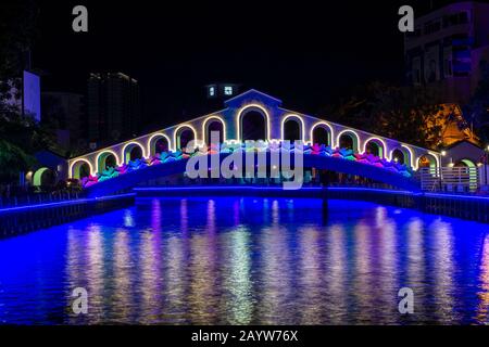 Night view of Jambatan Old Bus Station bridge over Melaka River in Malacca Malaysia Waterfront. Stock Photo