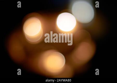 Holidays, luxury and background concept, blurred golden christmas lights bokeh. Stock Photo