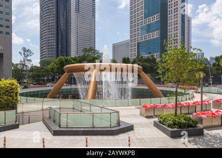 Fountain of Wealth at Suntec City shopping mall, Singapore. The fountain is unusual in that the water is falling inwards Stock Photo