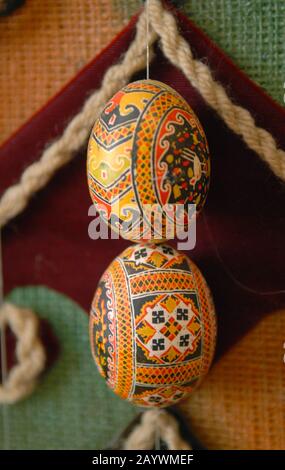 Easter composition - Pysankas (decorated eggs) against carpet background. Kolomyia. Stock Photo