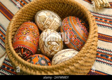 Pysankas (Easter eggs) in wicker basket. Kolomyia. Stock Photo
