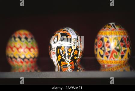 Pysankas against dark background. Easter holiday. Kolomyia. Stock Photo