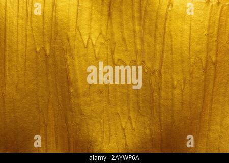 Metallic gold paint strokes texture background Stock Photo