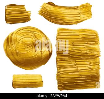 Gold paint hand brush stroke stain design elements set isolated on white background. Stock Photo