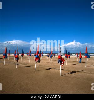 Folded parasols on the Deauville beach , Calvados, Normandy, France Stock Photo