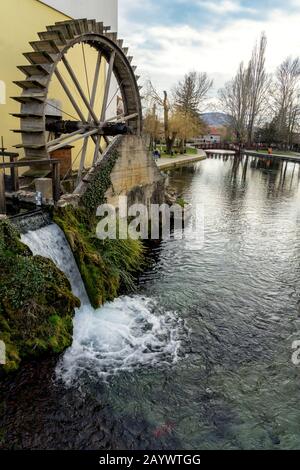 Main Square of Tapolca in Hungary part of the hungarian blue hiking trail with wooden old water mill Stock Photo