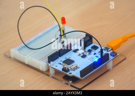 A small electronic module, printed circuit Board, or part of a computer. Selective focus Stock Photo