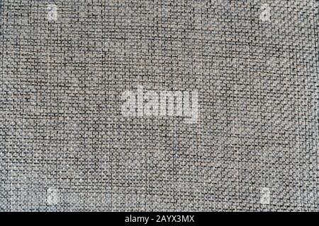 Abstract background of roughly woven grey fabric for design Stock Photo