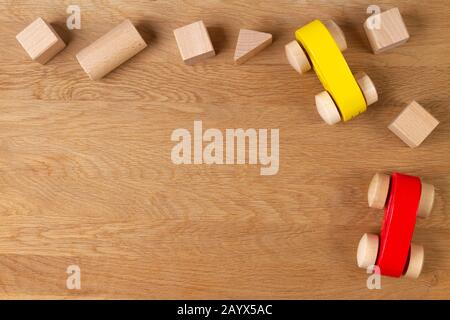 Baby kid educational natural eco zero waste wooden toys frame on wood background Stock Photo