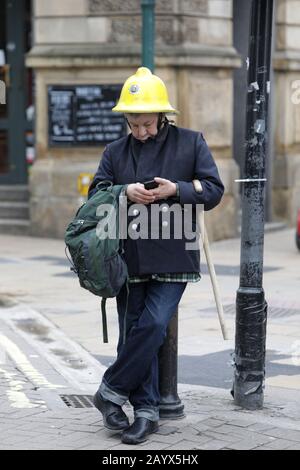 York, UK. A man dressed as a fire officer in York. Stock Photo