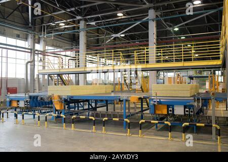 Horizontal no people shot of modern thermal-insulation and soundproof materials factory interior Stock Photo