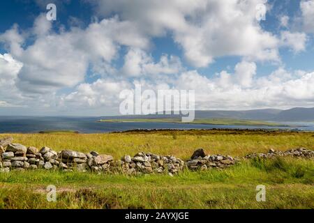 Orkney, Scotland, UK - walker on top of Stock Photo