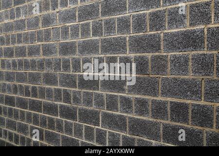 Garage wall lined with black foam block Stock Photo