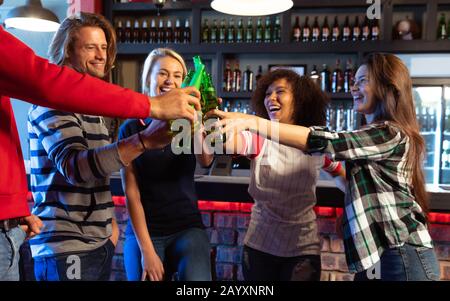 Friends having fun together while drinking Stock Photo