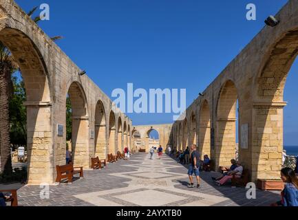 Valletta, Malta - October 11, 2019: Upper Barrakka Gardens terrace with colonnade, popular city landmark Stock Photo