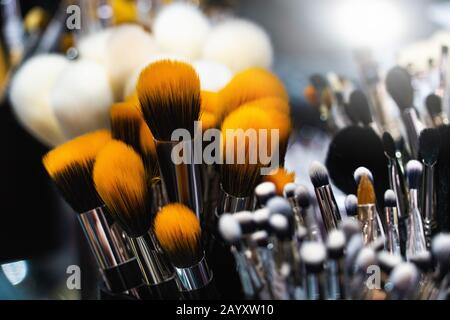 A collection of natural wool brushes for applying cosmetics, close-up. Stock Photo