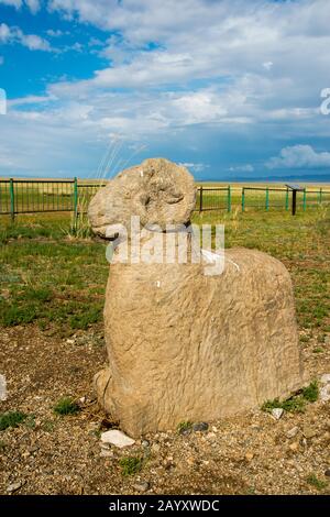 Ongot grave (Neolithic grave) in Tuul River valley with carved grave stones (ram), carved by people of Turkic origin about 1200 ? 1400 years ago, Hust Stock Photo