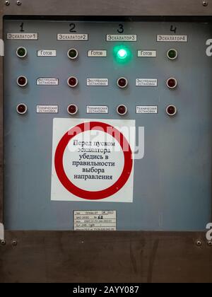 Moscow, Russia - February 8, 2020: Escalator control panel in hall of Moscow metro. Status indicators of operational running elevator stairs in subway Stock Photo