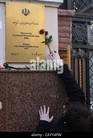 Kiev, Ukraine. 17th Feb, 2020. A man lays a flower to mourn those killed in a downed plane near Tehran in Iran on Jan. 8, at the Iranian Embassy in Ukraine in Kiev, Ukraine, on Feb. 17, 2020. The Ukrainian Boeing-737, which was flying from Tehran to Kiev, was mistakenly shot down by Iranian troops on Jan. 8 near Tehran shortly after take-off. In total, 167 passengers and 9 crew members were killed. Credit: Sergey Starostenko/Xinhua/Alamy Live News Stock Photo