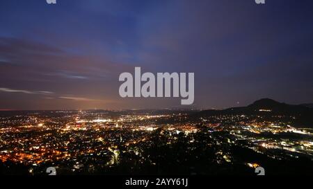 Reutlingen, Germany: Panorama from the Georgenberg mountain over the city at night time Stock Photo