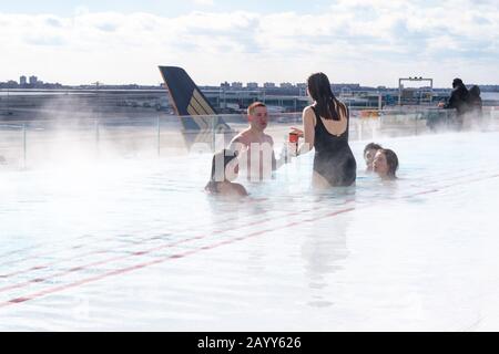 Guests Enjoying The Rooftop Infinity Pool At The TWA Hotel At John F ...