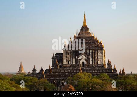 View of the ancient That Bin Nyu (Thatbinnyu) Temple in Bagan, Myanmar (Burma), on a sunny afternoon. Temple is under restoration after an earthquake. Stock Photo