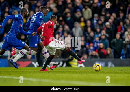 London, UK. 17th Feb, 2020. Odion Ighalo (on loan from Shanghai Shenhua) of Man Utd (right) shoots during the Premier League match between Chelsea and Manchester United at Stamford Bridge, London, England on 17 February 2020. Photo by David Horn. Credit: PRiME Media Images/Alamy Live News
