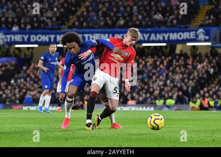 London, UK. 17th Feb, 2020. Brandon Williams of Manchester United battles for possession with Willian of Chelsea FC during the Premier League match between Chelsea and Manchester United at Stamford Bridge, London on Monday 17th February 2020. (Credit: Ivan Yordanov | MI News) Photograph may only be used for newspaper and/or magazine editorial purposes, license required for commercial use Credit: MI News & Sport /Alamy Live News Stock Photo