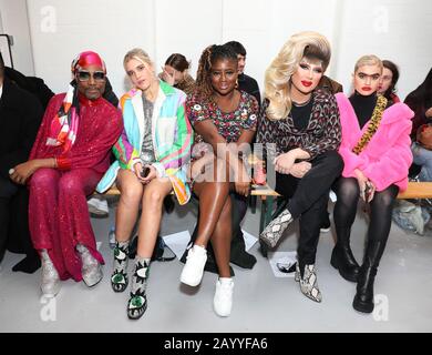 (left to right) Billy Porter, Tiger Lily Taylor, Clara Amfo, Jodie Harsh, and Sophia Hadjipanteli on the front row during the Ashish show at London Fashion Week February 2020 show at The Mess Hall in London. PA Photo. Picture date: Monday February 17, 2020. Photo credit should read: Isabel Infantes/PA Wire Stock Photo