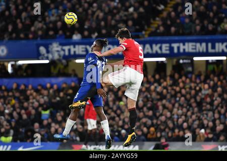 London, UK. 17th Feb, 2020. Harry Maguire of Manchester United contests a header with Michy Batshuayi of Chelsea FC during the Premier League match between Chelsea and Manchester United at Stamford Bridge, London on Monday 17th February 2020. (Credit: Ivan Yordanov | MI News) Photograph may only be used for newspaper and/or magazine editorial purposes, license required for commercial use Credit: MI News & Sport /Alamy Live News Stock Photo