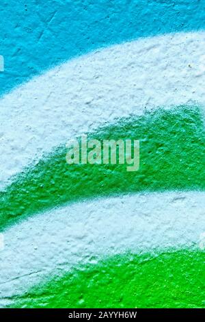 Abstract texture of plaster from the lines of blue, white and green. Vertical. Stock Photo